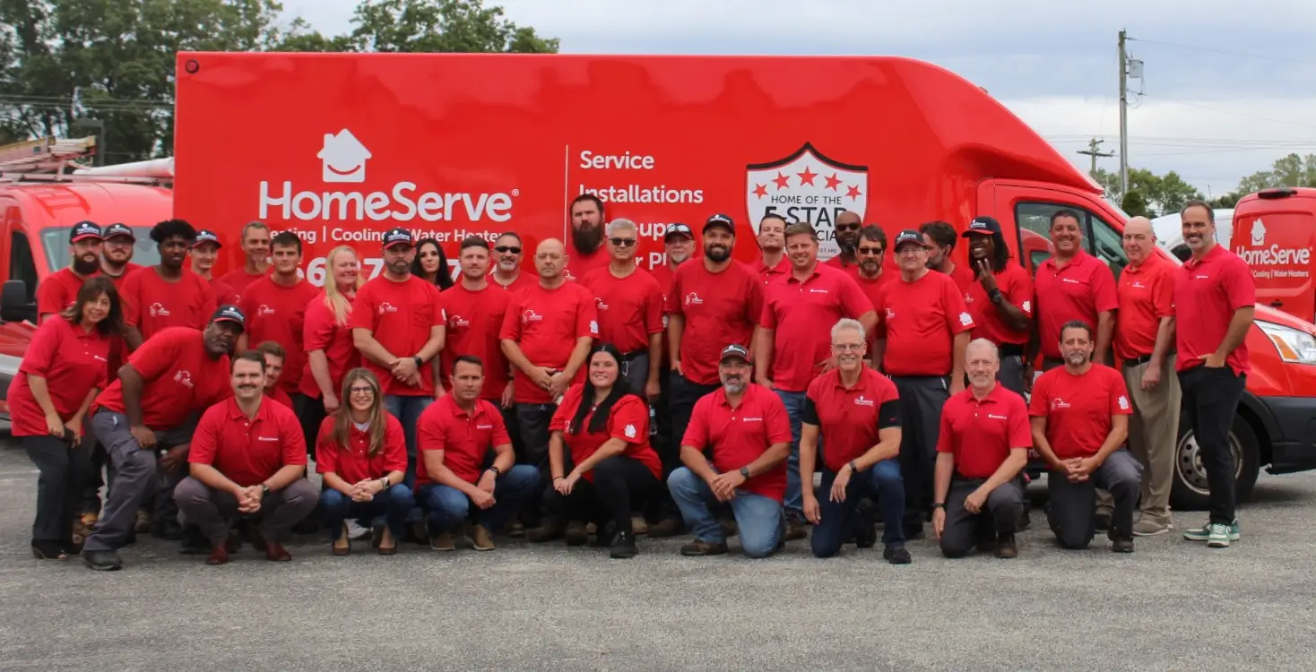 HomeServe of South Jersey Team Photo in front of their red service van.